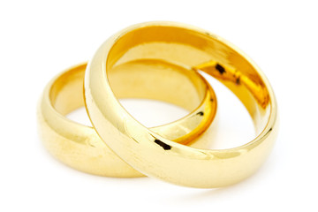 Two golden wedding on white