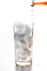 Red juice and glass with ice