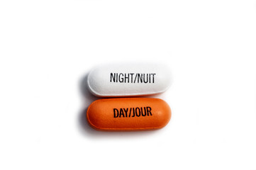 Obraz na płótnie Canvas Day and night pill