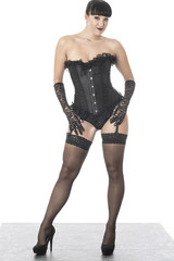BDSM Fetish Model in Stockings and Corset