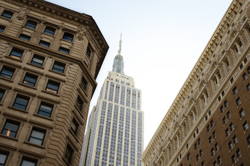 Empire State Building between buildings