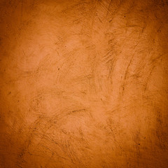 Dark and light brown or orange painted