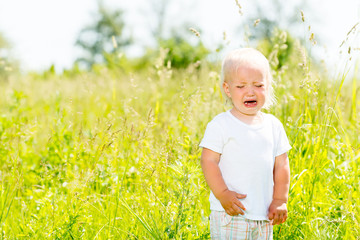 Child crying is on the nature