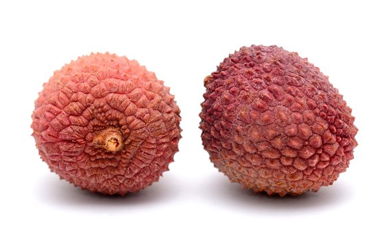 Litchi (Litchi chinensis) placed on the white background.