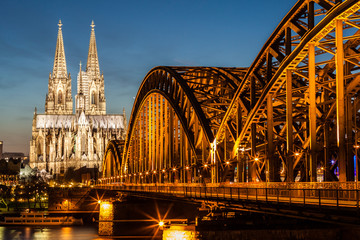 Hohenzollern Bridge and Cologne Cathedral at dusk