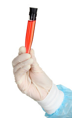 Glass tube with fluid in scientist hand during medical test