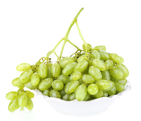 Ripe green grapes on plate isolated on white