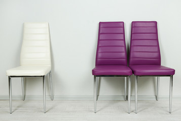 Obraz premium Modern color chairs on wall background
