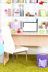 Workplace with laptop, close up