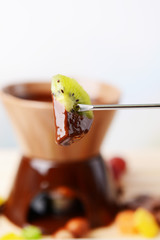 Chocolate fondue with fruits,