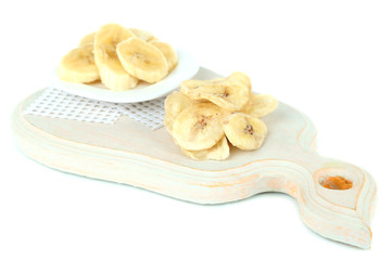 Fresh and dried banana slices, isolated on white