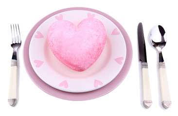 Heart on plate, isolated on white