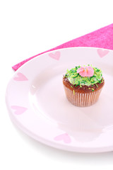 Tasty cupcake with butter cream,