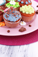 Tasty cupcakes with butter cream,