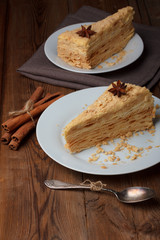 Slice of layer cake with anise and cinnamon
