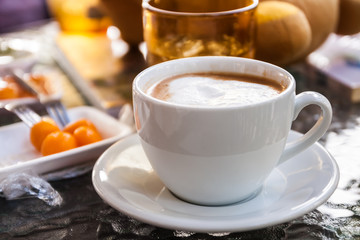 Hot coffee and sweetmeat