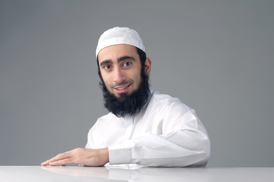 Arabic Muslim man with beard smiling