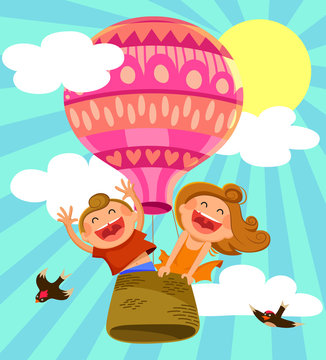 two happy kids flying in a hot air balloon