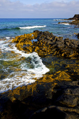 beach  light   foam rock spain  stone sky cloud