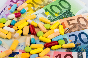 Eurogeldscheine und Tabletten