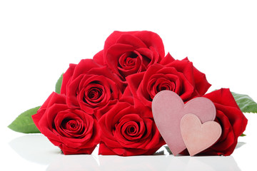 Obraz na płótnie Canvas Heart tags with red roses