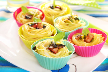 pasta nests baked in silicone muffin molds