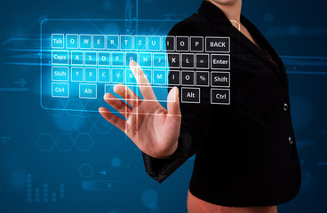 Girl pressing virtual type of keyboard