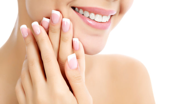 Face, hands and healthy white teeth of a woman, white background