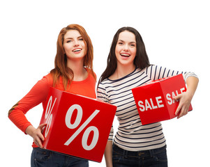 smiling teenage girl with percent and sale sign