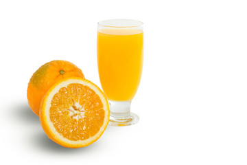 Glass of fresh orange juice with sliced oranges on white backgro