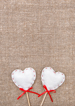 Textile hearts on the burlap