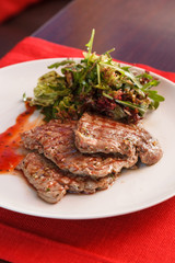 steak with salad