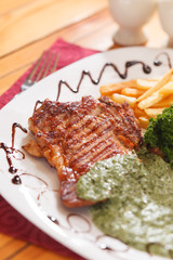 Grilled steak with french fries