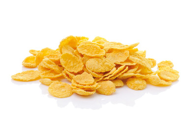 Sweet, tasty cornflakes, dry crispy on white background