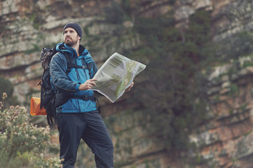 outdoor hiking man with map