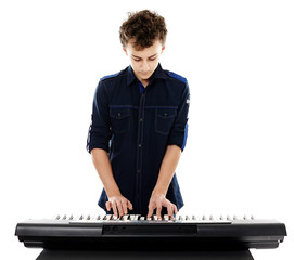 Teenager playing an electronic piano