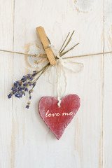Heart over a wooden background