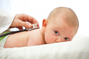  pediatrician visits Caucasian newborn stethoscope. concept childcare health.