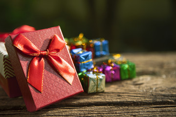 red gift box on old  wood floor  for multipurpose gift festival