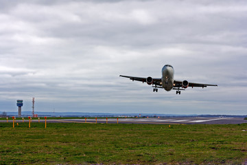 Fototapeta na wymiar Airplane taking off