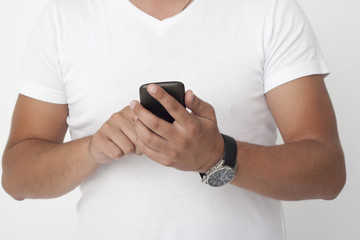 man writes a text message