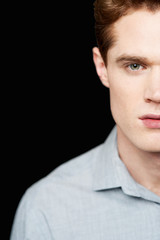 Obraz premium Half face portrait of a smart guy