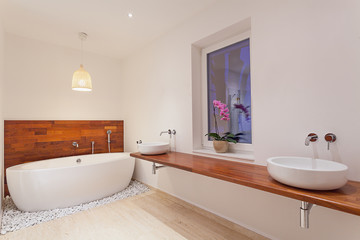 Fototapeta na wymiar Interior of modern bathroom with window