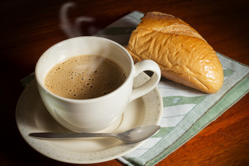 Cappuccino coffee with bread.