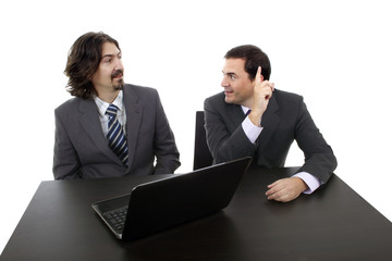 Obraz premium Two business men with laptop computer
