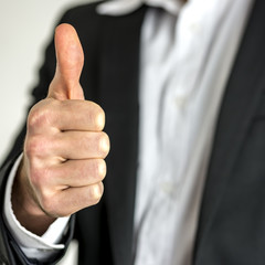 Businessman with thumb up