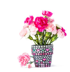 Carnation in mosaic flower pot 