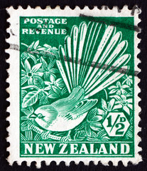 Fototapeta premium Postage stamp New Zealand 1935 Pied Fantail and Clematis