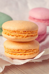 Multicolored macaroon on parchment