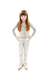 Little girl with ice skates on white background